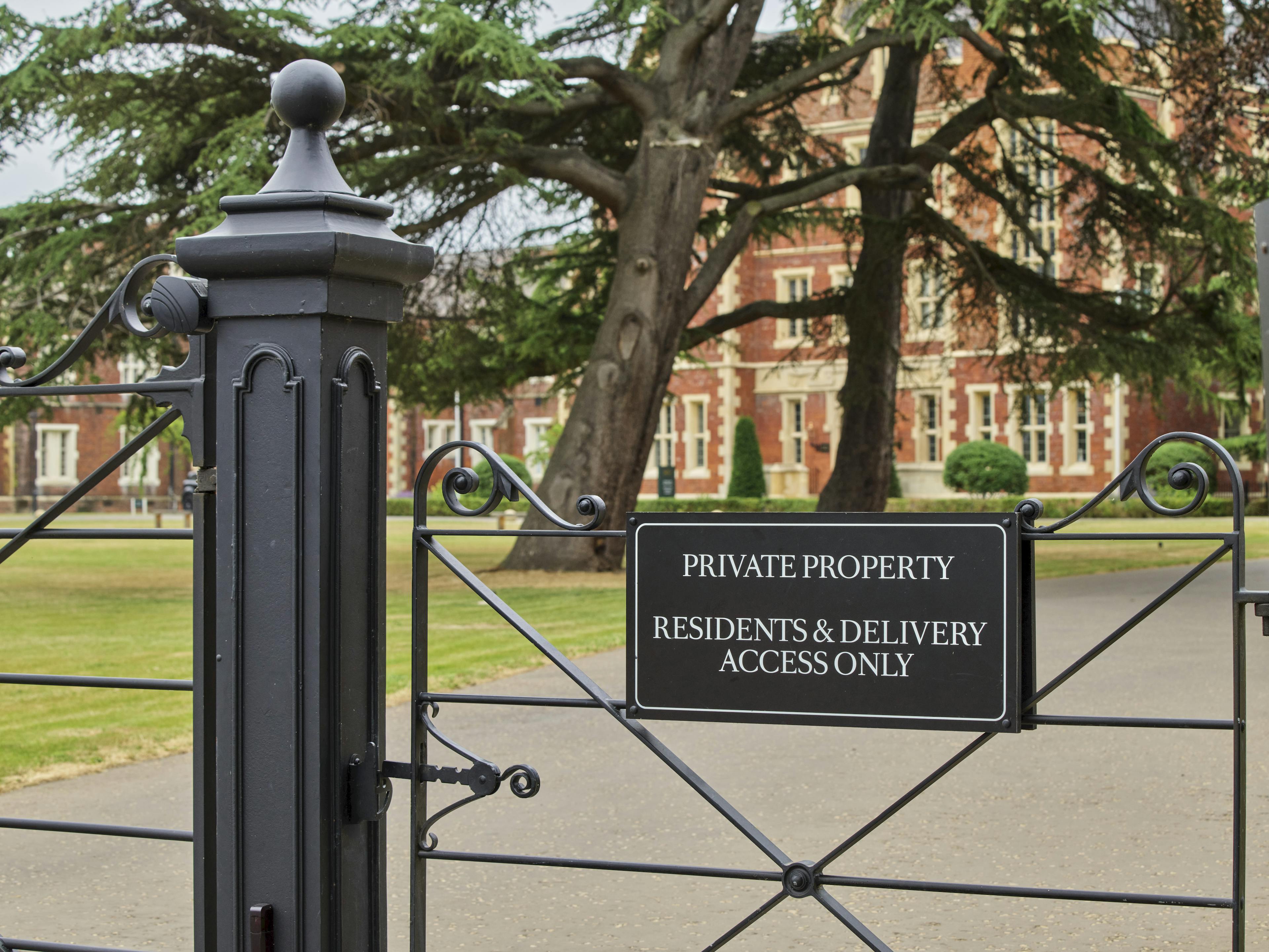 Caption: a gate with a private property sign on it