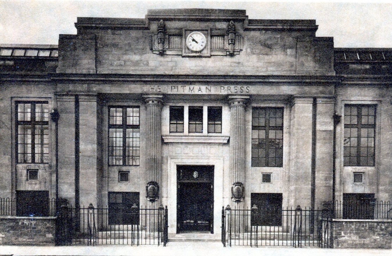 Caption: a black and white photo of a building with a clock