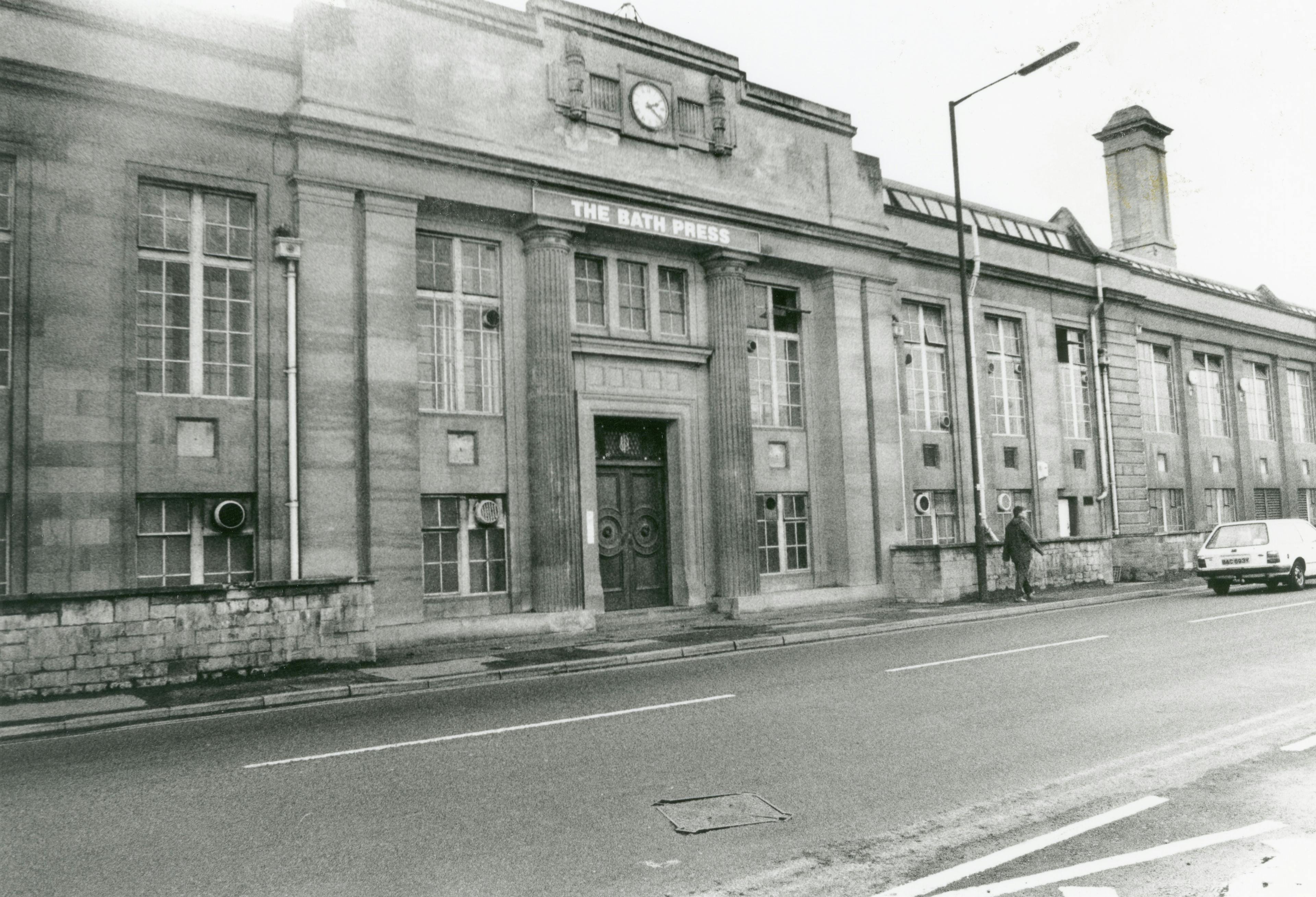 Caption: a black and white photo of an old building