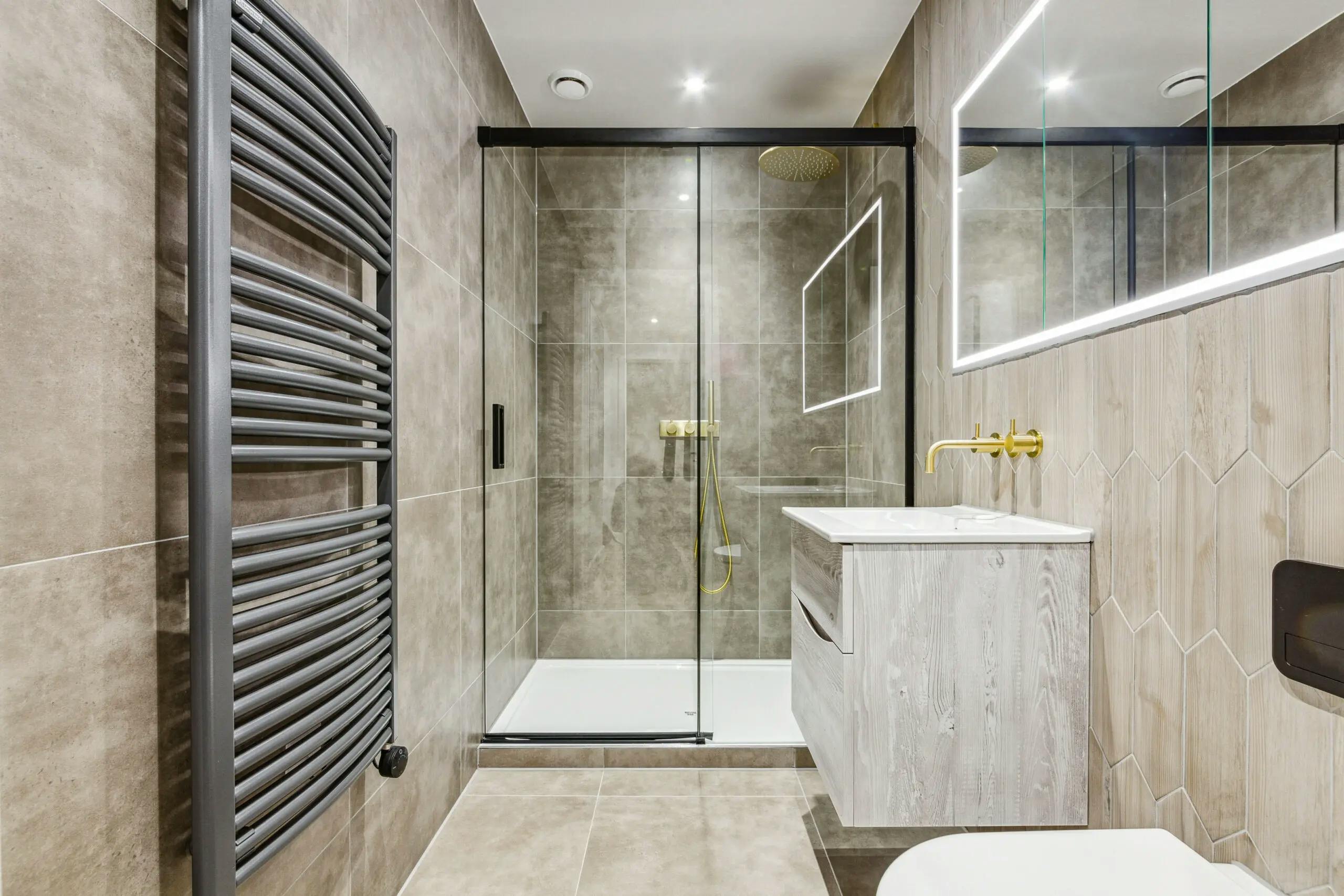 Caption: a bathroom with a toilet, sink, and shower