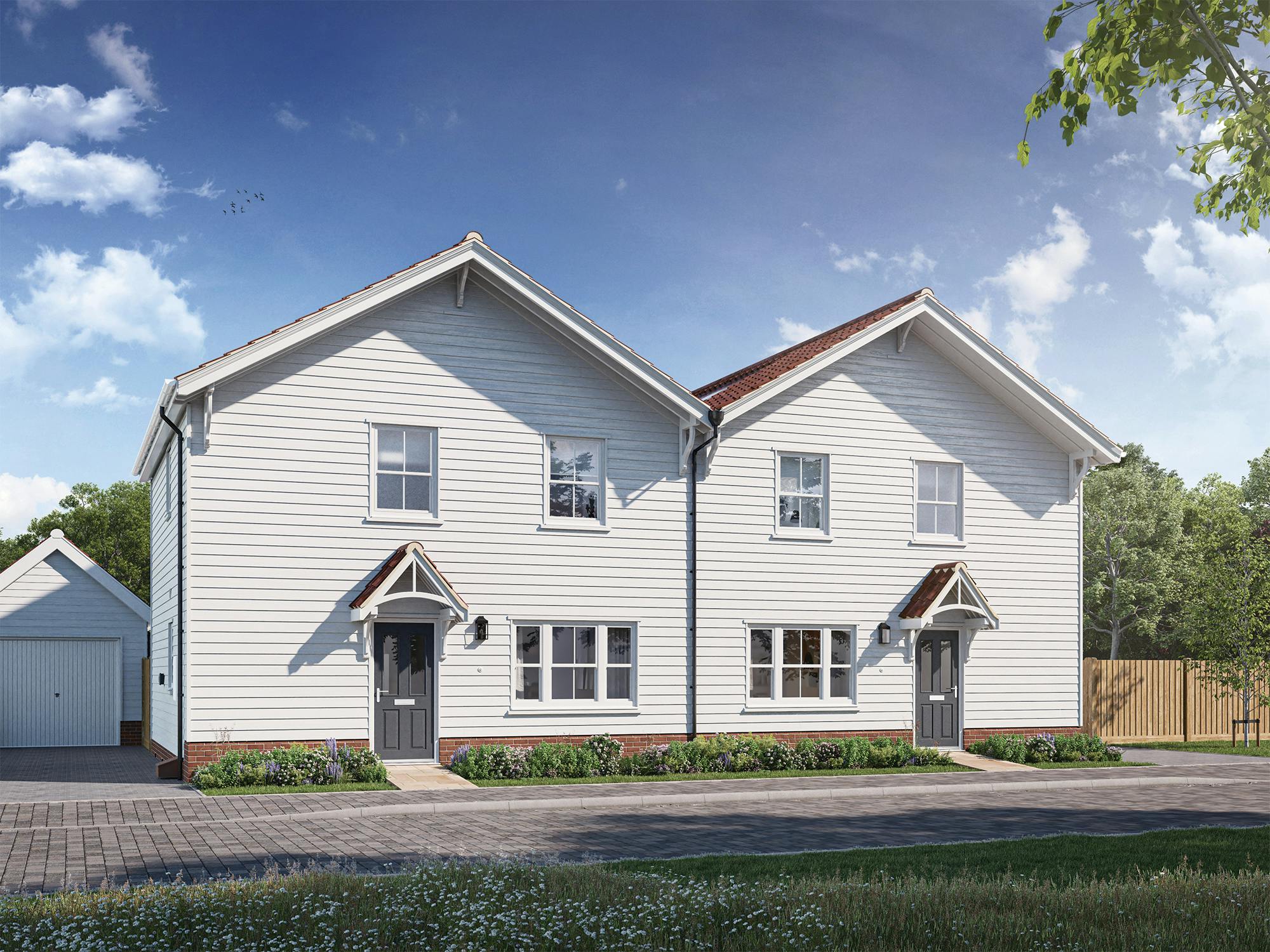 Caption: a two story white house with two garages