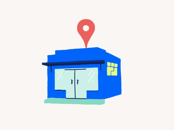 Multicolor illustration of a building with a location pin on top.