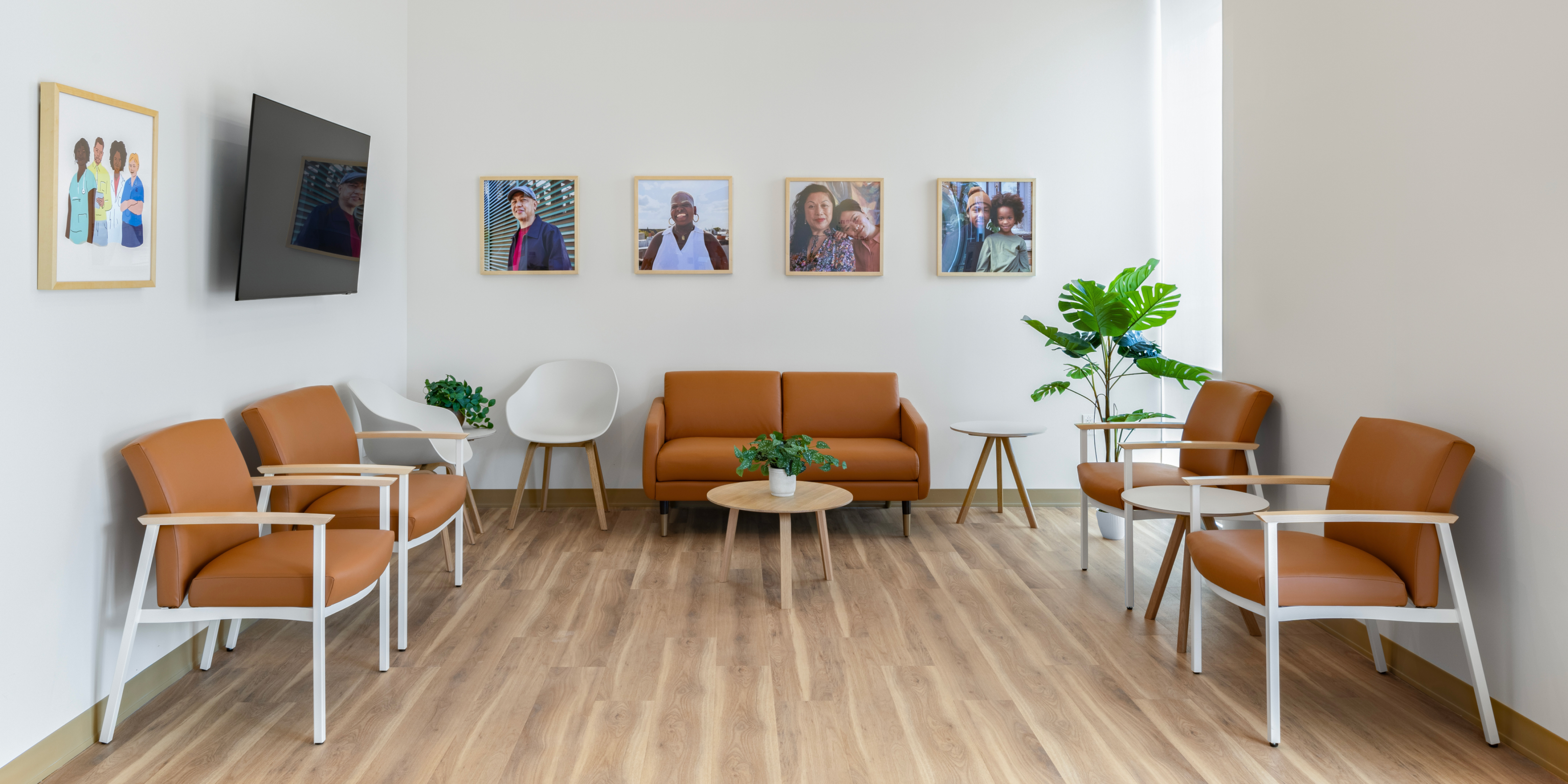 Cincinnati waiting room with tan modern chairs and wood floors.