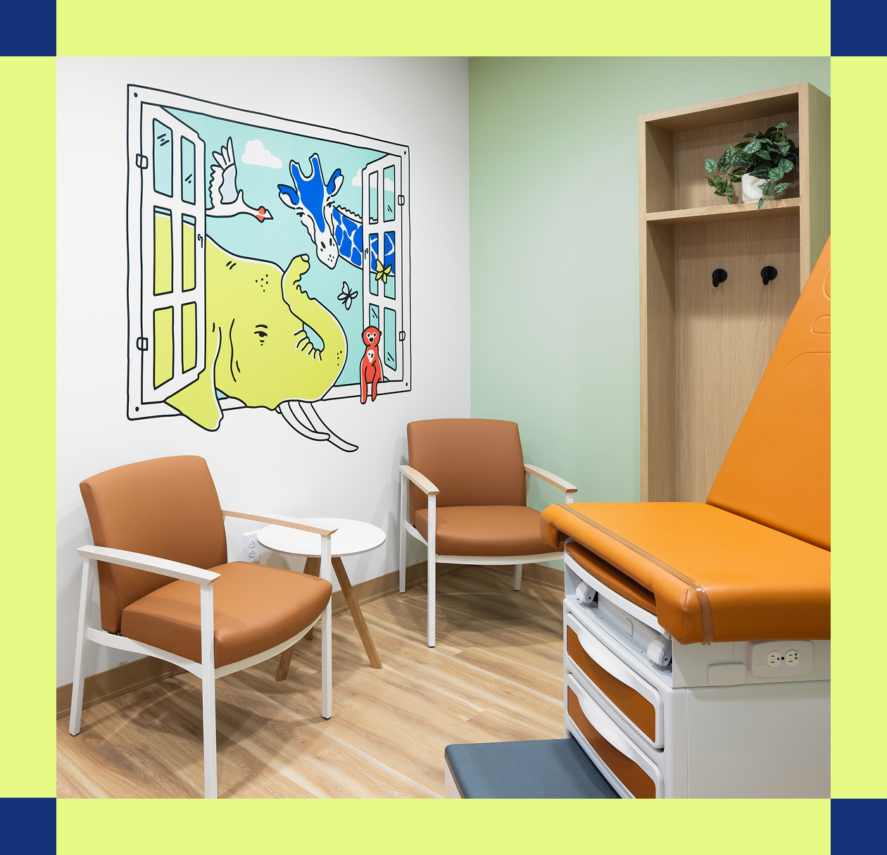 Interior of a family care room in the Cityblock Fayetteville clinic with a multi-colored border.