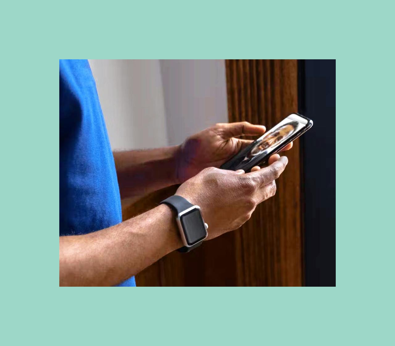 Person holds smartphone while on a video call.
