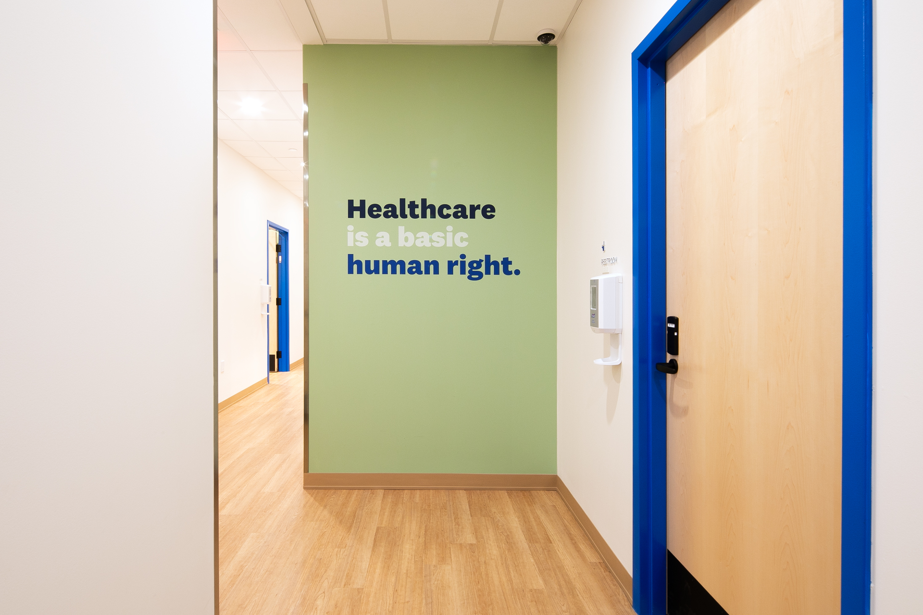 Hallway at Cityblock Bed-Stuy with wall art that says "Health care is a basic human right".