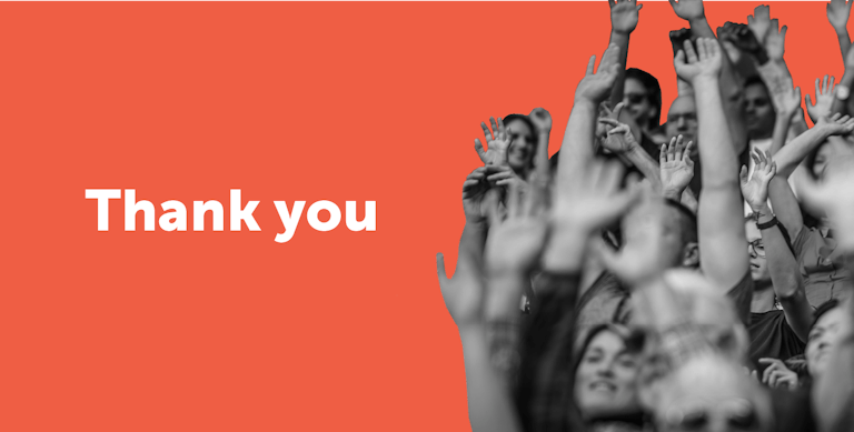 Thank you banner with a happy crowd image.