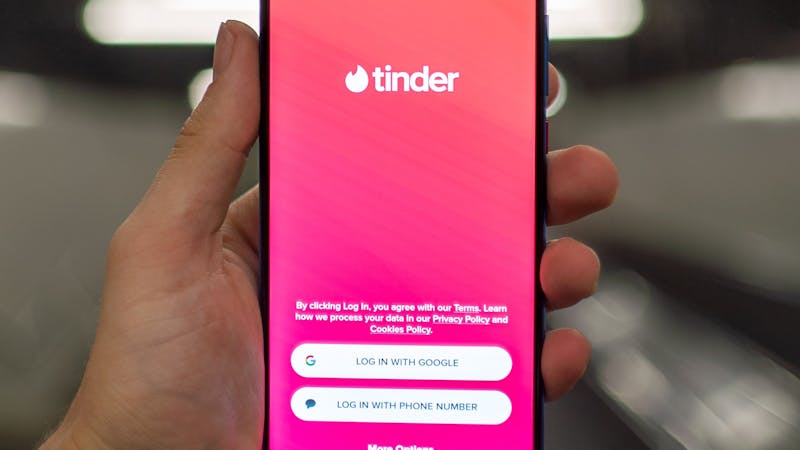 Splash screen of tinder dating app.