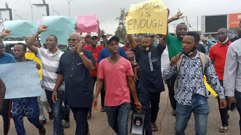Members of the Coalition for Civil Societies in Osun State, who on Friday morning protested against the hike in electricity tariff and petrol price.