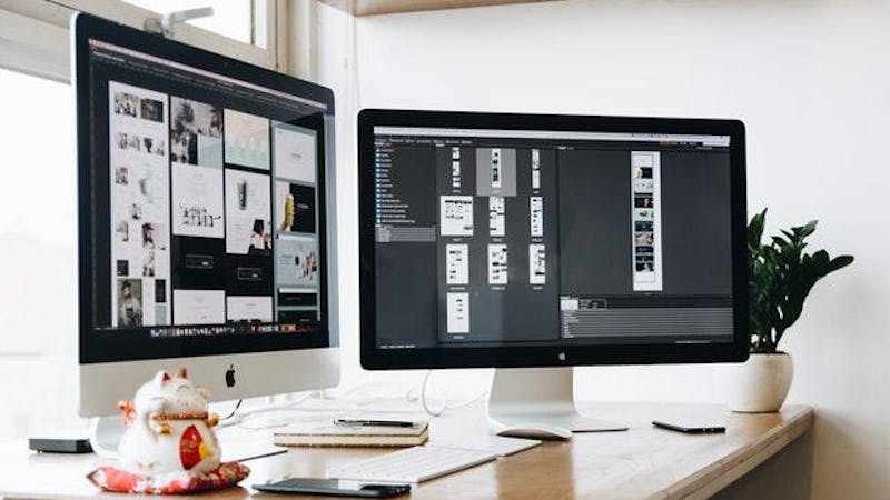 Two Apple Mac workstations.