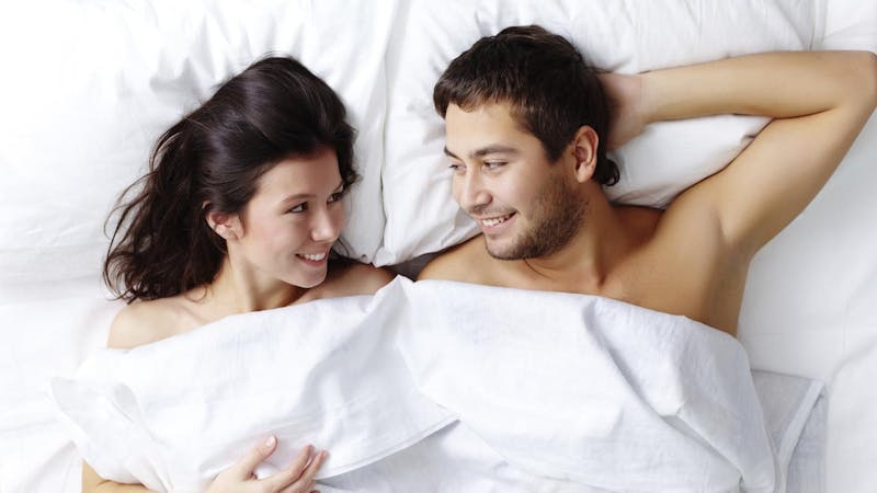 A couple living in the same and sharing one bed
