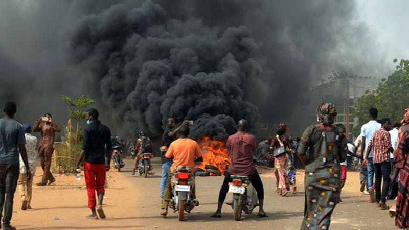 Crime scene, tyres and houses burnt