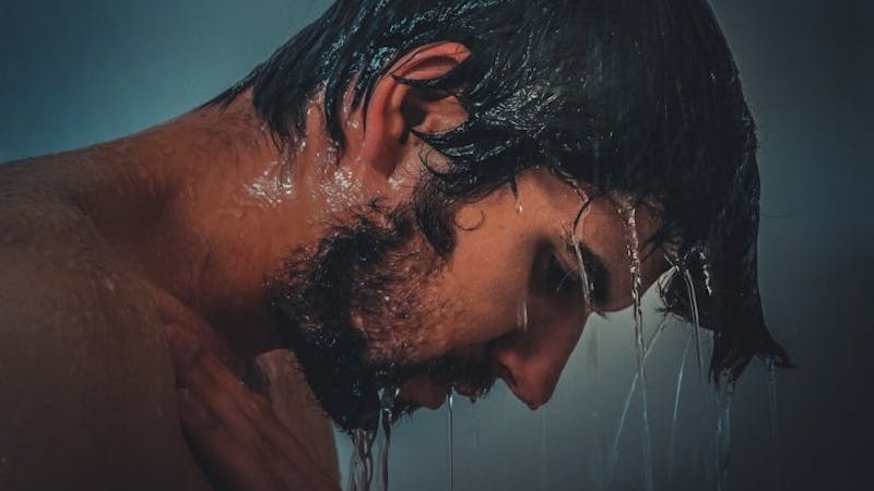 picture of a man whose heart has been broken, main in deep thoughts