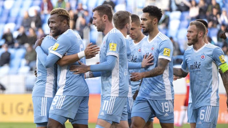 Ezekiel Henty, second left, celebrates with his Slovan Bratislava teammates after scoring