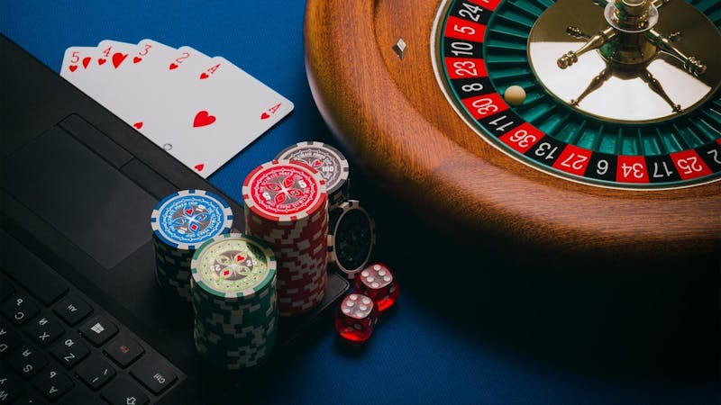 A typical casino gambling tool; poker, blackjack and dice.