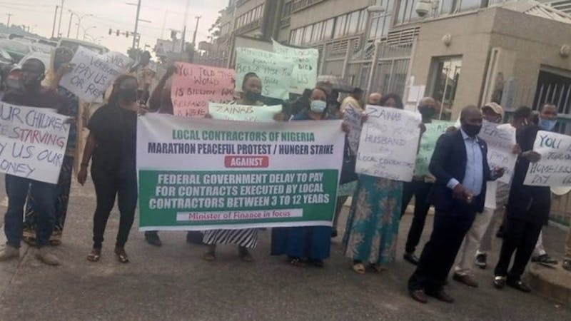 Group, known as local contractors of Nigeria protest against non-payment of contracts by the Finance Ministry in Abuja.