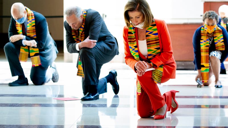 US House democrats take a knee on Capitol Hill in respect to George Floyd.