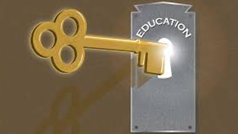 Key written education by the side and opening a padlock