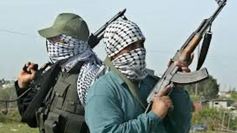 Arm robbers carrying a gun