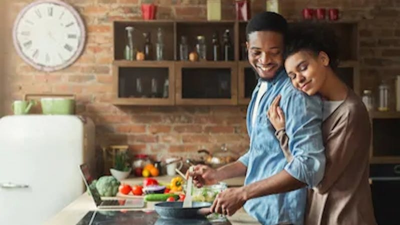 A man cooking for his wife. Women love their men cooking