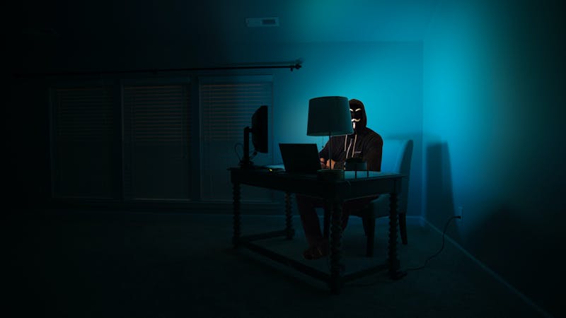 A hacker trying to access a computer system.