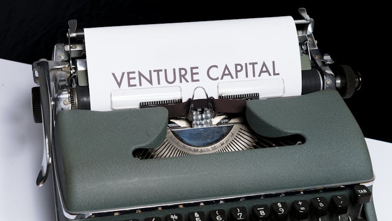 Manual typewriter with the words -Venture Capital.