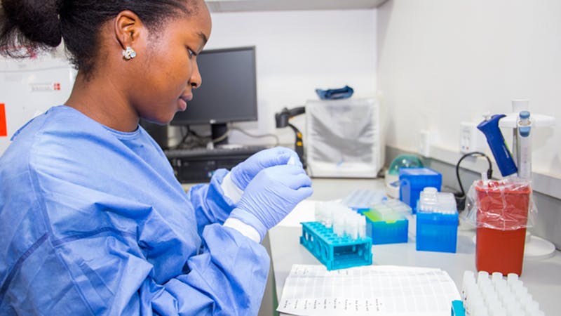 A health working at the National Public Health Reference Laboratory in Gaduwa, Abuja.