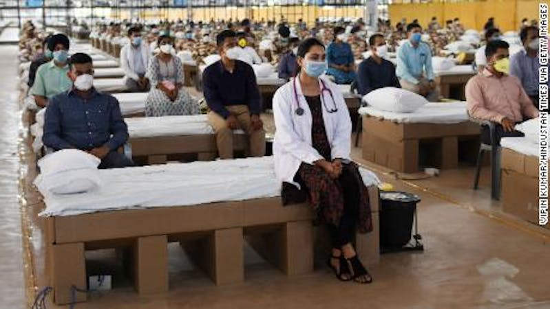 Medical practitioners during the inauguration of the Sardar Patel COVID Care Centre, India's biggest hospital for the fight against COVID-19