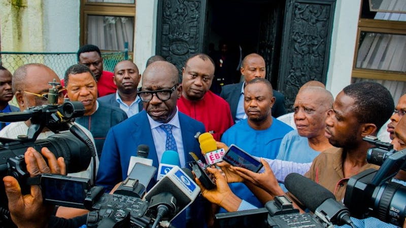 Governor Godwin Obaseki in a tussle with Oshiomole