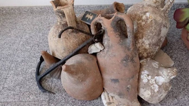 Ancient Roman artefacts (jars) found in a Spanish seafood shop