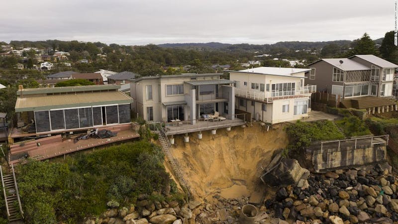 Luxury beachfront homes in danger of collapsing into the ocean along the Wamberal beach in Australia's South Wales state