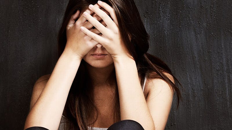 A female child depressed due to child abuse