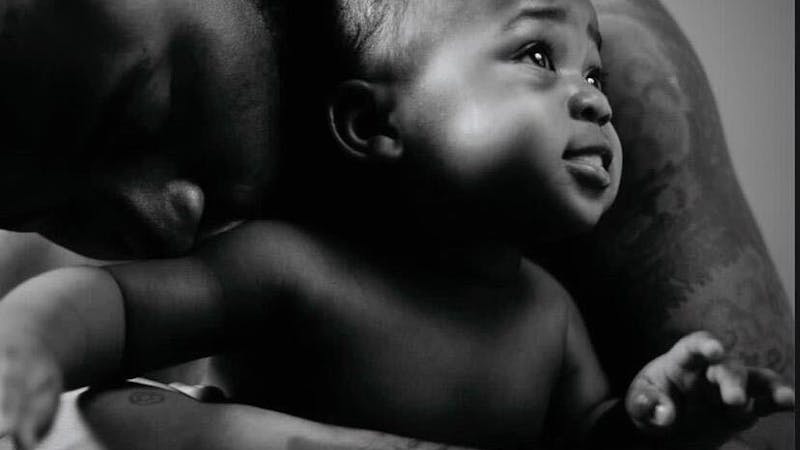 Davido posed with his son, Ifeanyi Adeleke, in a photoshoot for his latest album 'A better Time'.