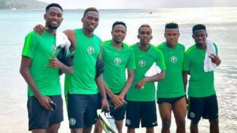 Wilfred Ndidi, Kenneth Omeruo, Ahmed Musa, Henry Onyekuru, Samuel Kalu in Nigerian kits at the beach