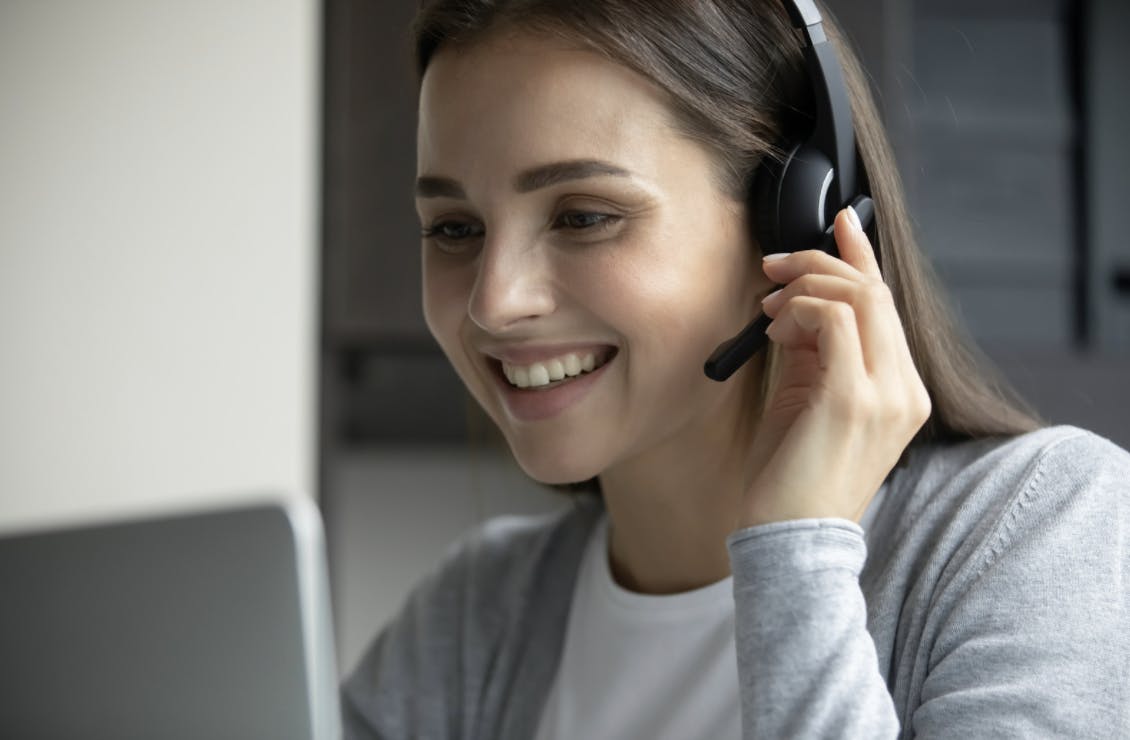 Woman talking through her headset