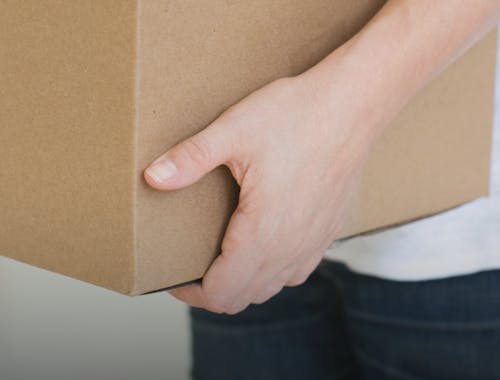Person holding a box