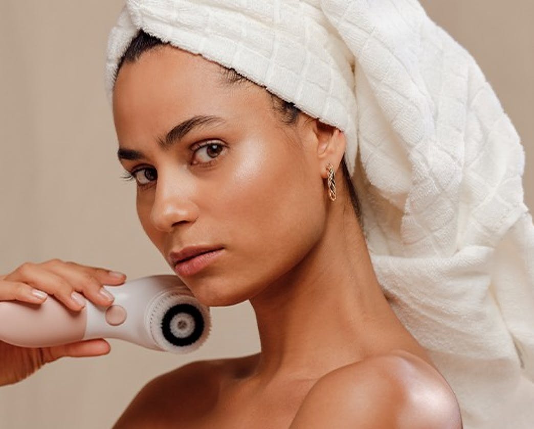 model holding vanity planet
