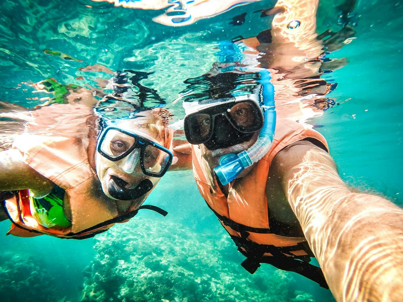 Is Swimming the Perfect Exercise? Seniors snorkeling diving