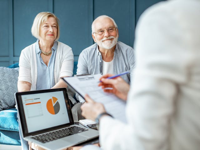 Couple meeting with a retirement coach