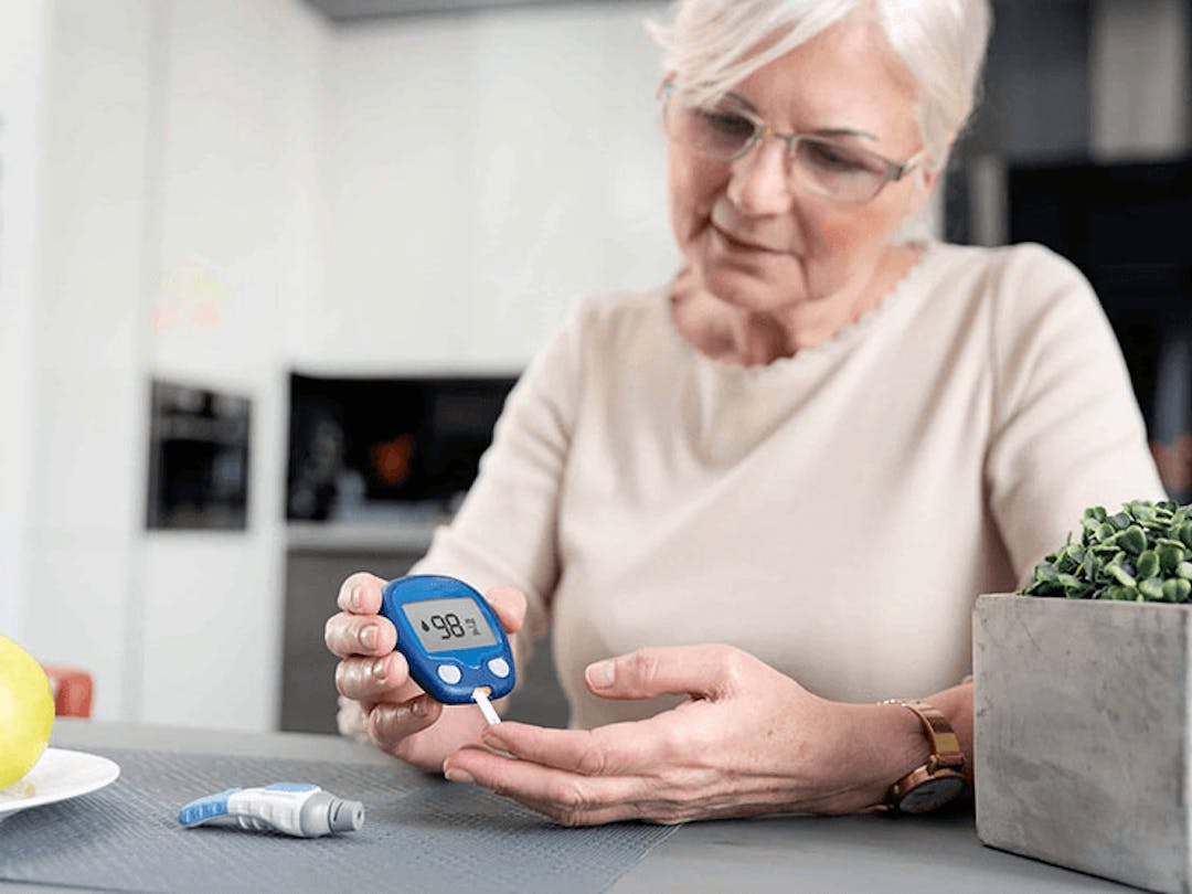 Woman checking her sugar level