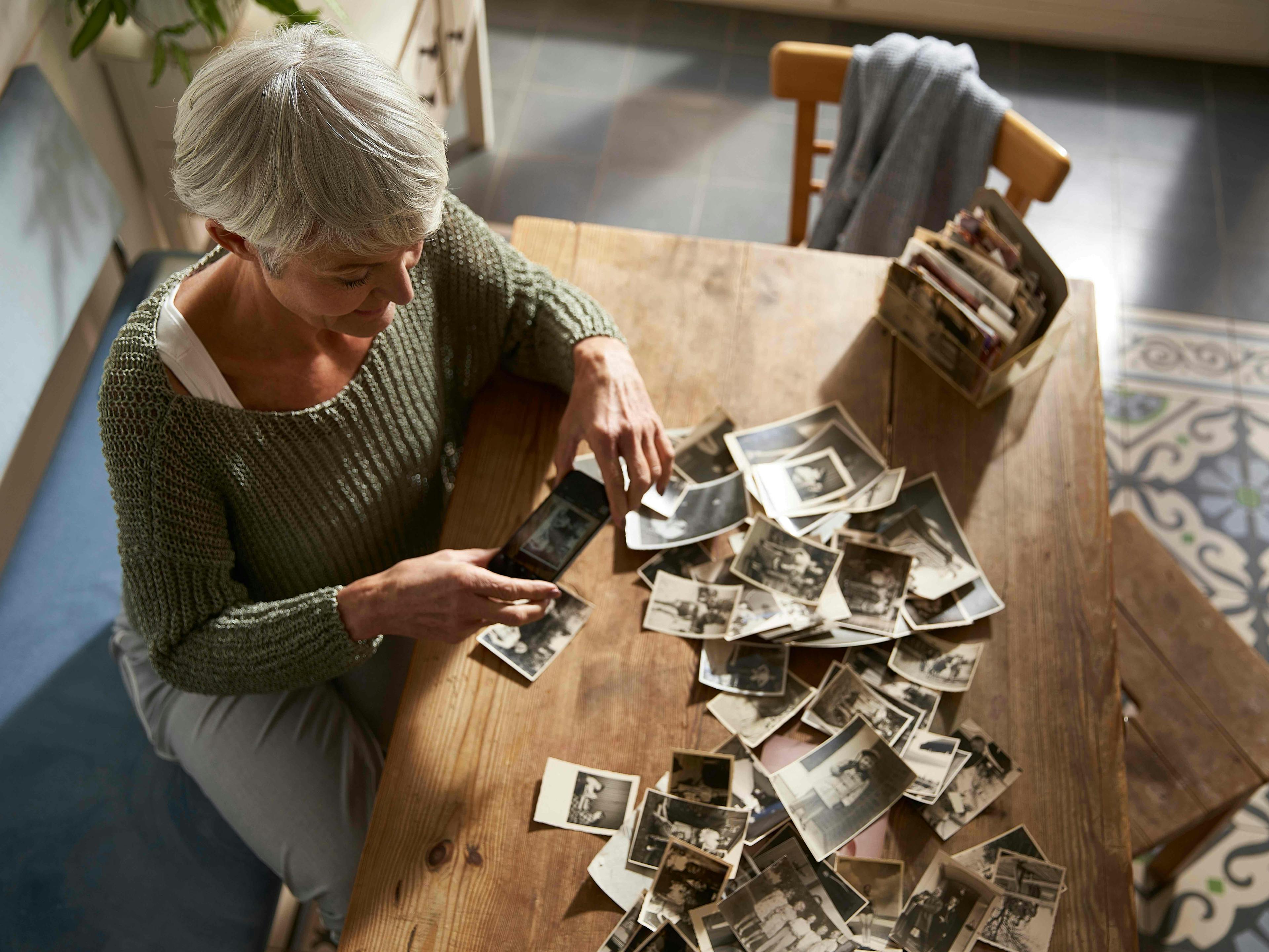 woman sorting photos