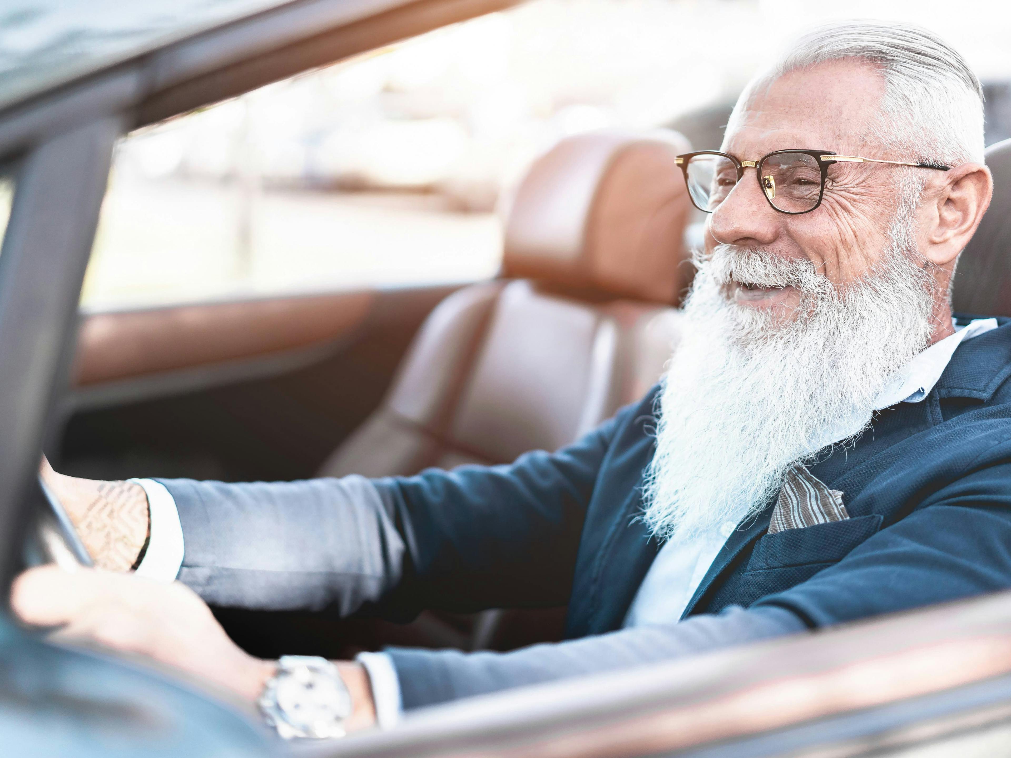 Senior Man driving a car