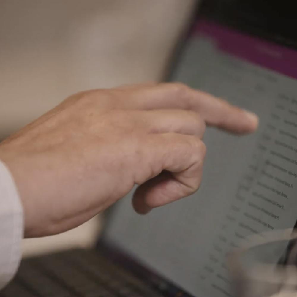 Person using a touch screen notebook