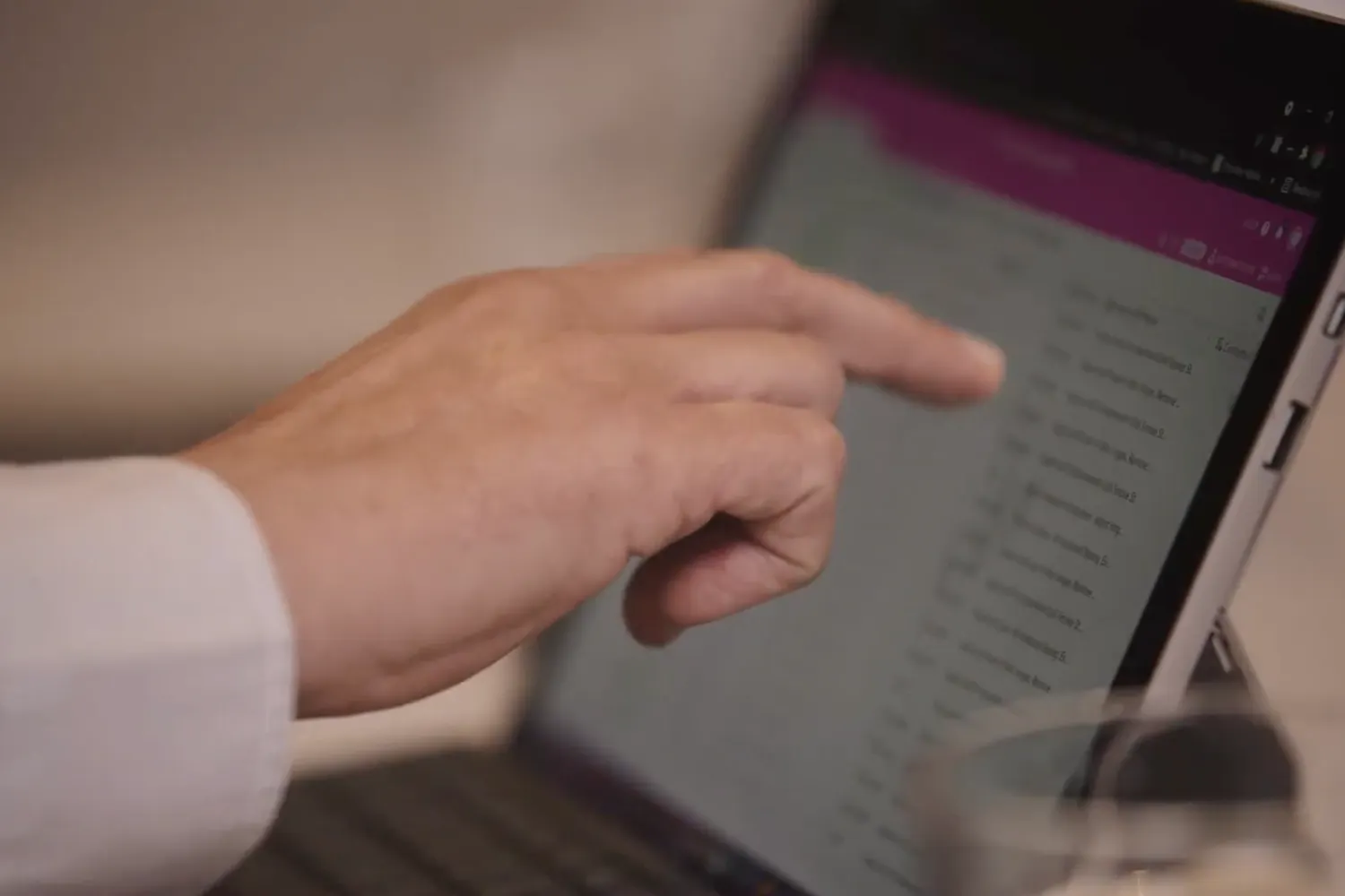 Person using a touch screen notebook
