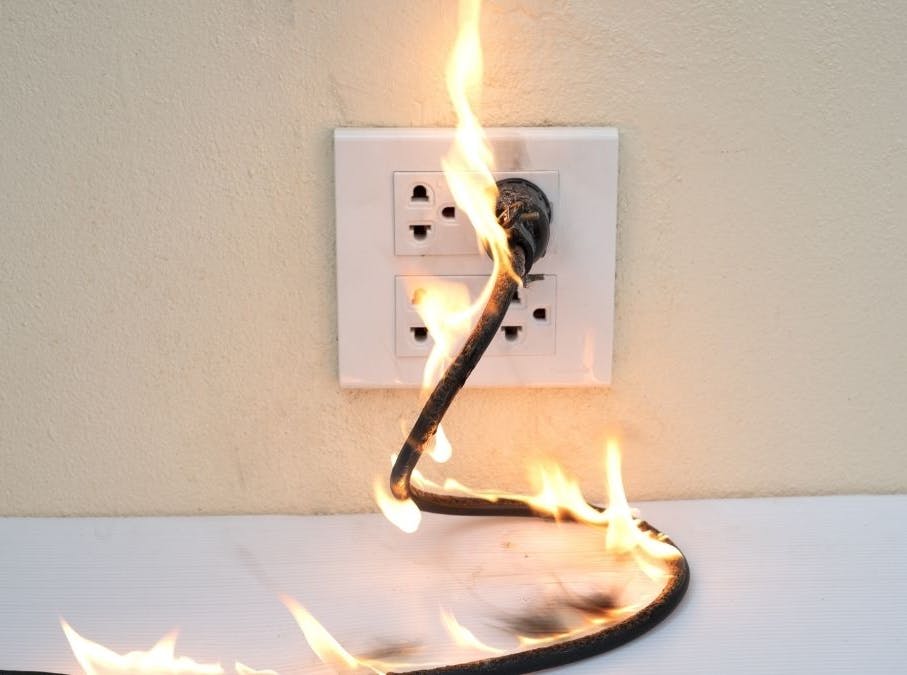Plug socket on fire