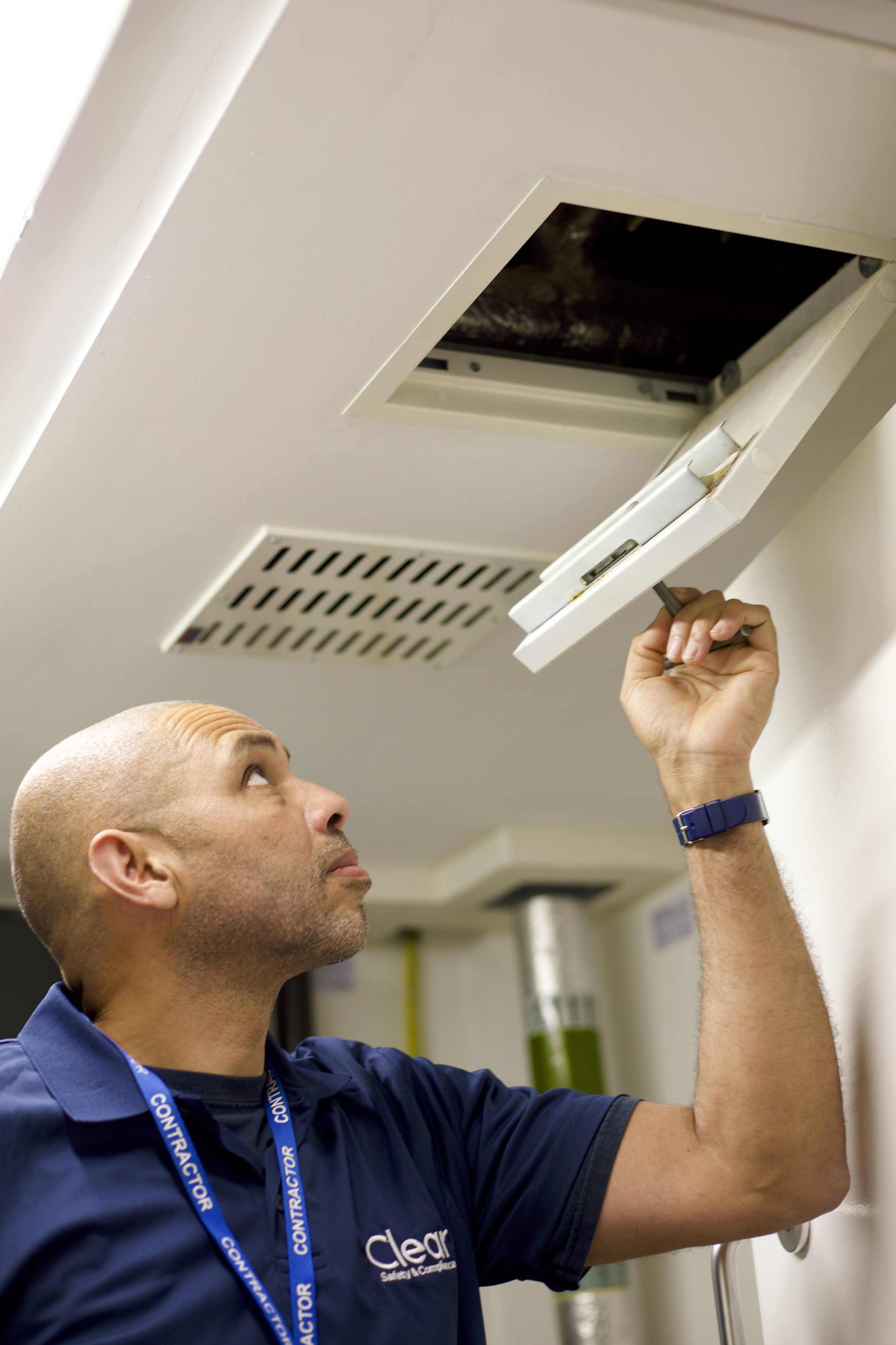 Clear Safety inspector Andy visually checking ceiling vent