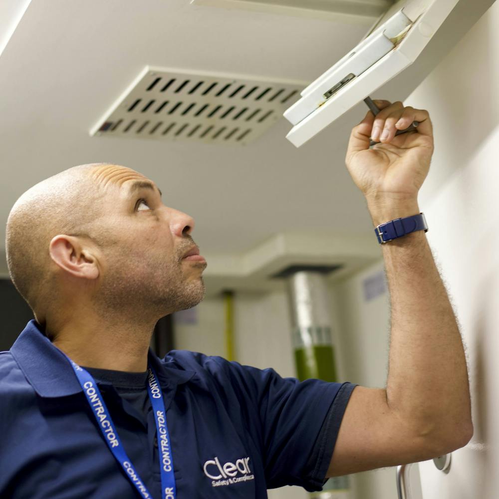 Clear Safety inspector Andy visually checking ceiling vent