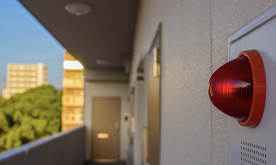 Visual fire alarm on the exterior of a building