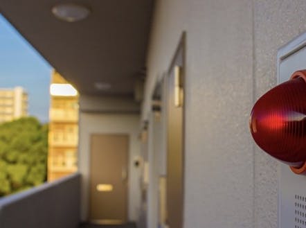Visual fire alarm on the exterior of a building