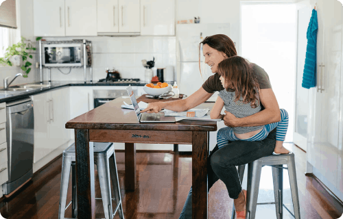 Mother and daughter using the ClimateClever Home platform